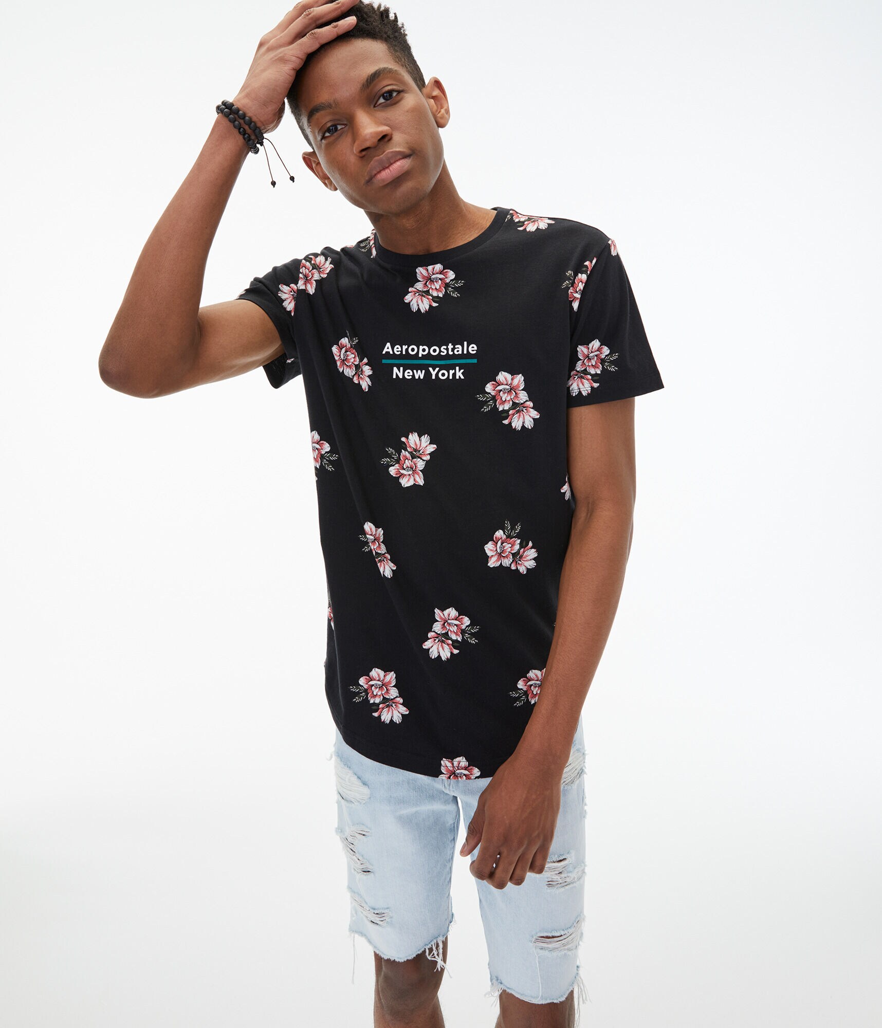 Aeropostale 1987 Floral Curved Hem Tee