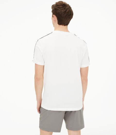 Grid Logo Sleeve Tape Stretch Graphic Tee Grid Logo Sleeve Tape Stretch Graphic Tee