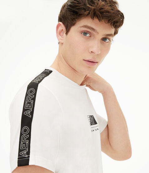 Grid Logo Sleeve Tape Stretch Graphic Tee Grid Logo Sleeve Tape Stretch Graphic Tee