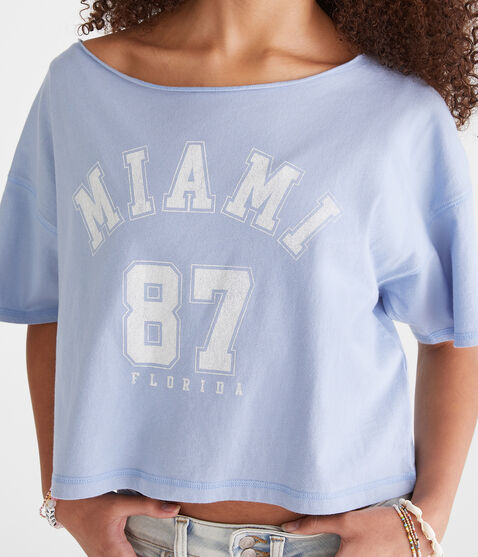 Miami 87 Off-The-Shoulder Cropped Boyfriend Graphic Tee Miami 87 Off-The-Shoulder Cropped Boyfriend Graphic Tee