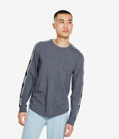Long Sleeve Heritage Logo Tape Stretch Graphic Tee Long Sleeve Heritage Logo Tape Stretch Graphic Tee