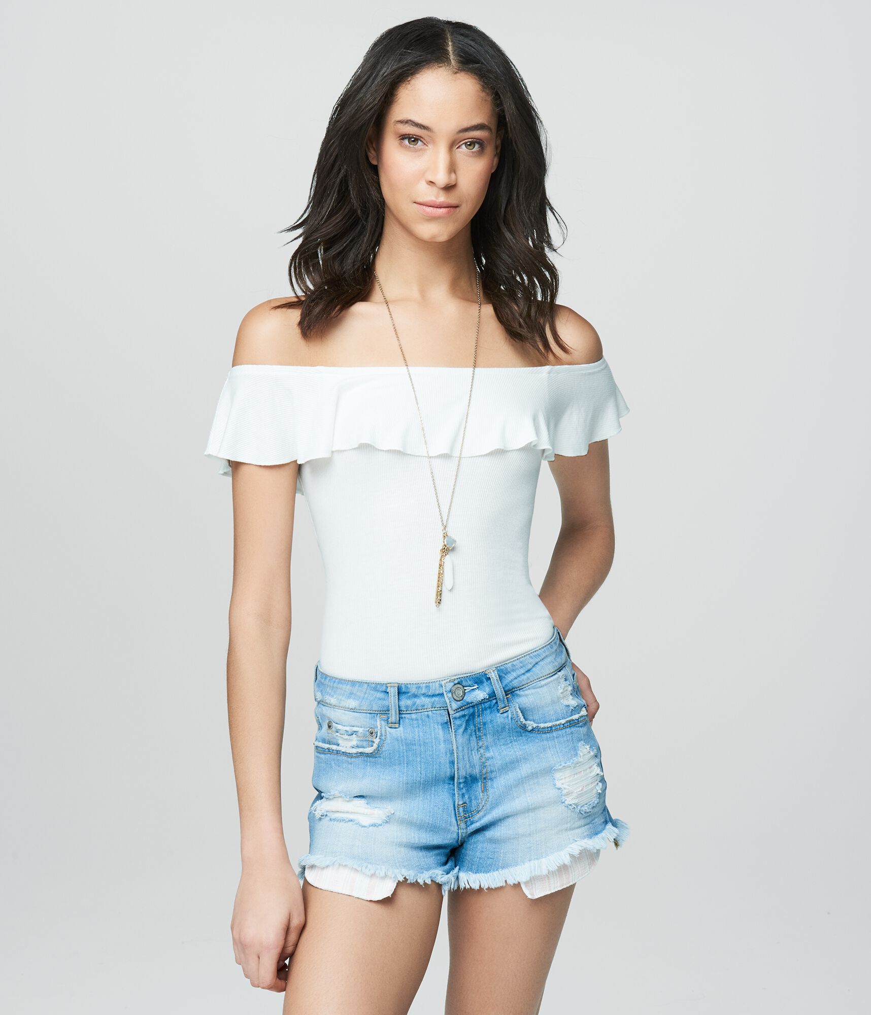 Cape Juby Solid Ruffle Bodycon Top