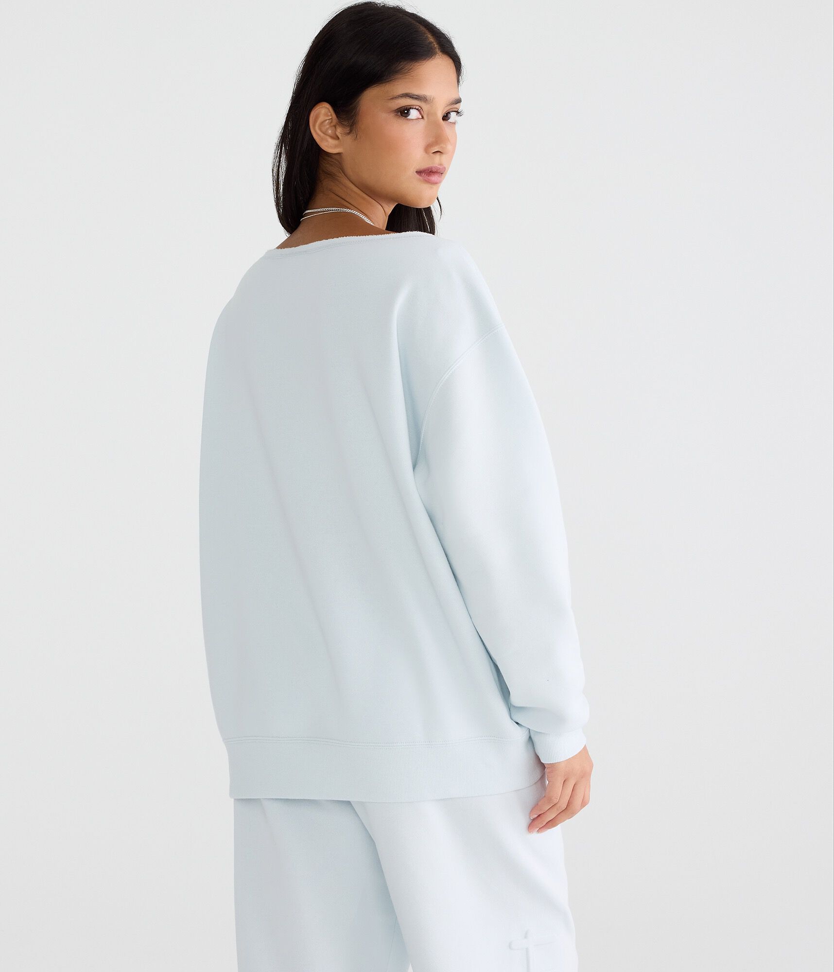 Hello Kitty Embossed Face Oversized Off-The-Shoulder Sweatshirt
