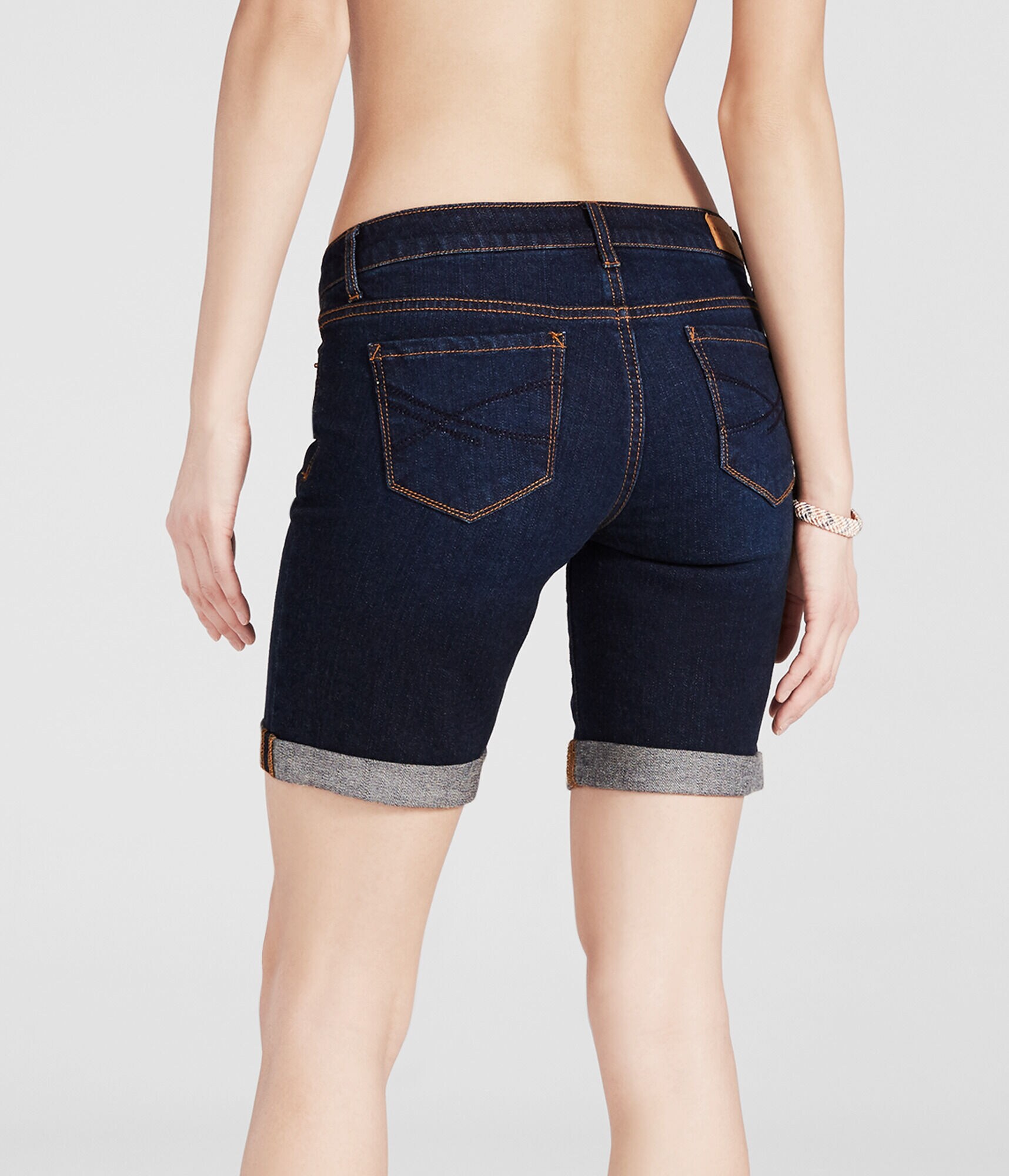 Dark Wash Cuffed Denim Bermuda Shorts***