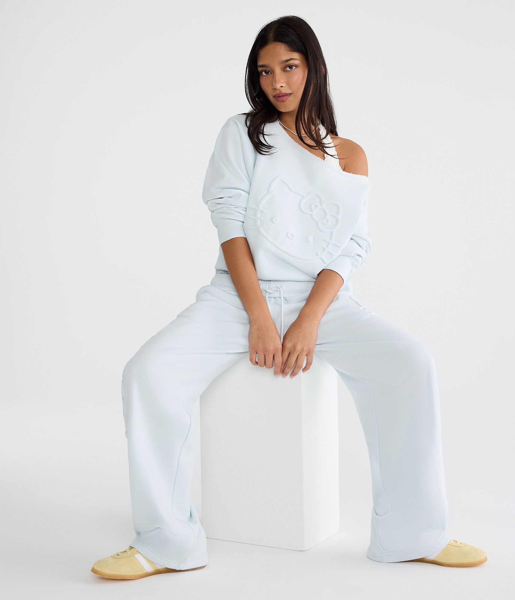 Hello Kitty Embossed Face Oversized Off-The-Shoulder Sweatshirt