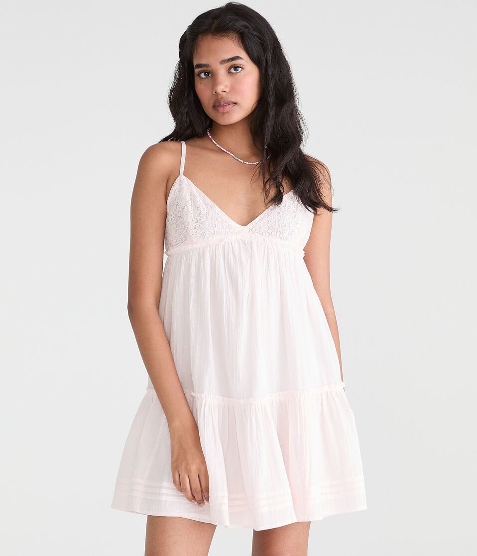 Solid V-Neck Crocheted Babydoll Mini Dress Solid V-Neck Crocheted Babydoll Mini Dress