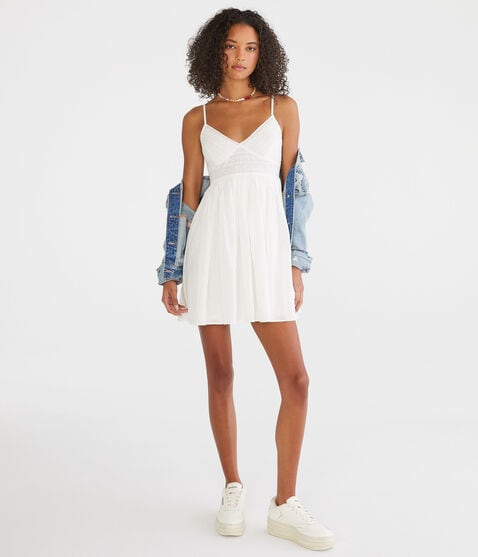 Solid V-Neck Eyelet Babydoll Dress Solid V-Neck Eyelet Babydoll Dress