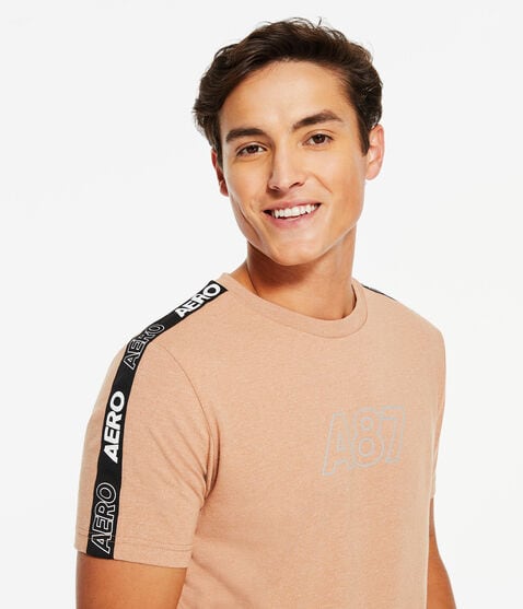 A87 Logo Sleeve Tape Stretch Graphic Tee A87 Logo Sleeve Tape Stretch Graphic Tee