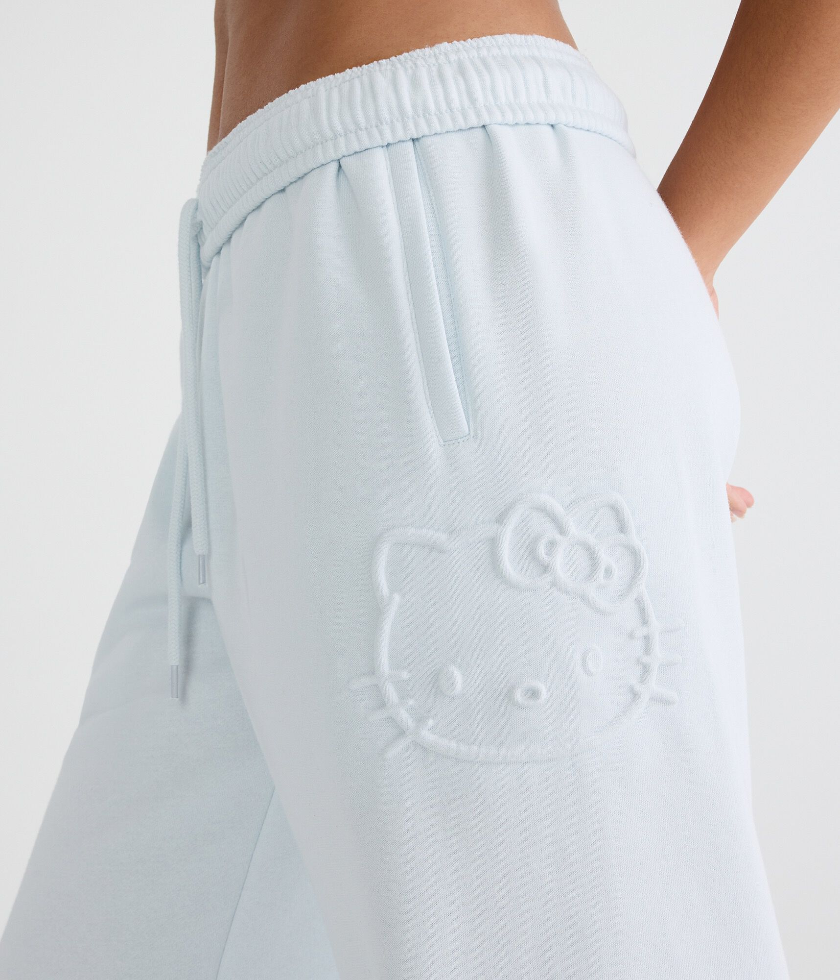 Hello Kitty Embossed Face Mid-Rise Straight Leg Sweatpants