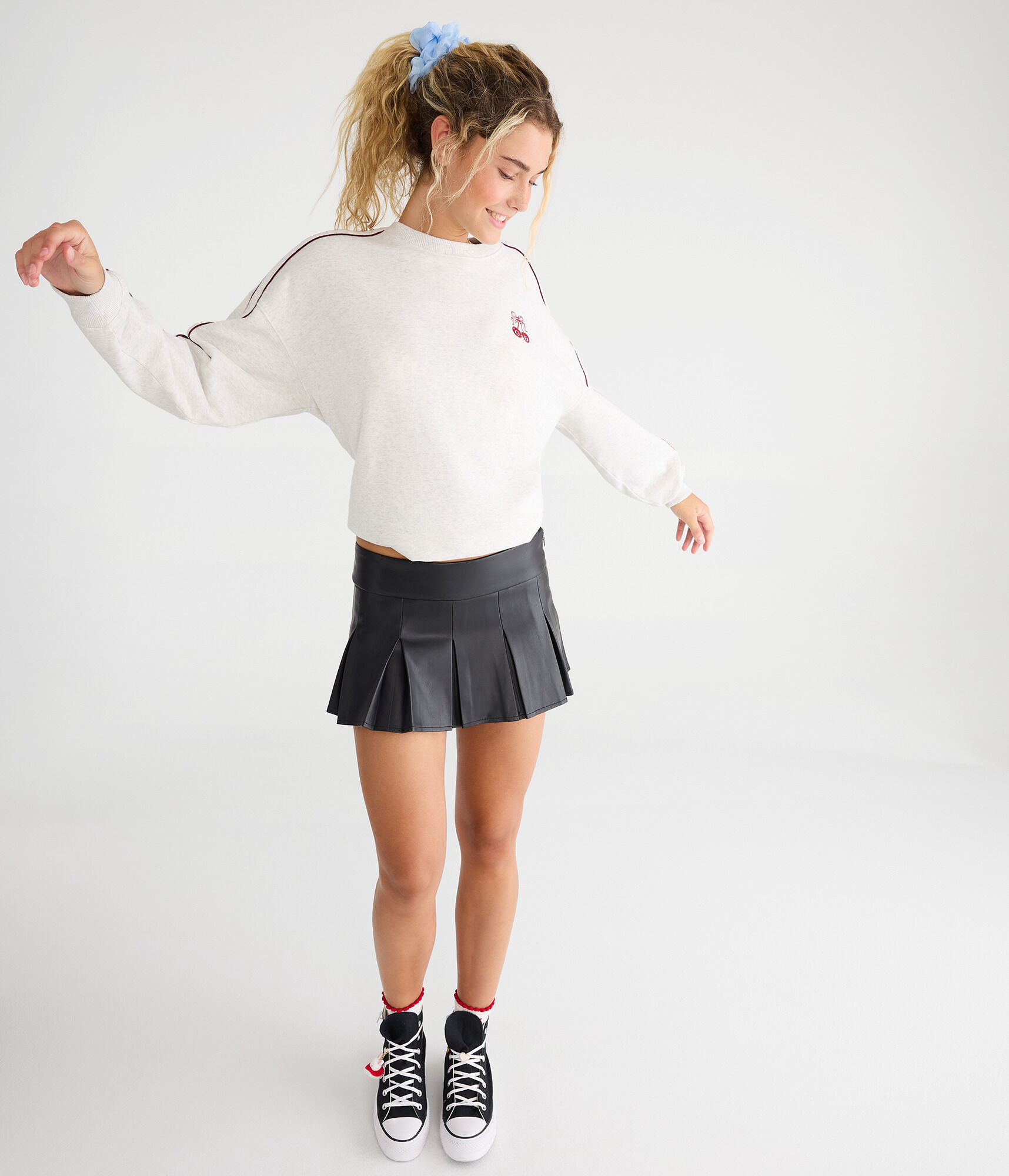 Pleated Faux Leather Mini Skirt