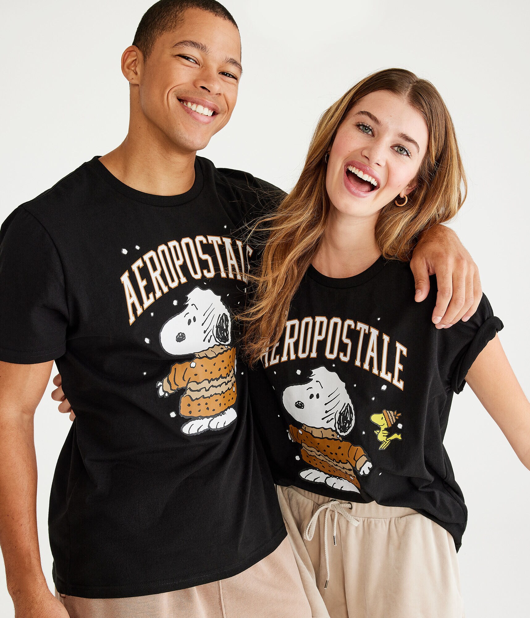 Peanuts&reg; | A&eacute;ropostale Snoopy Sweater Logo Graphic Tee