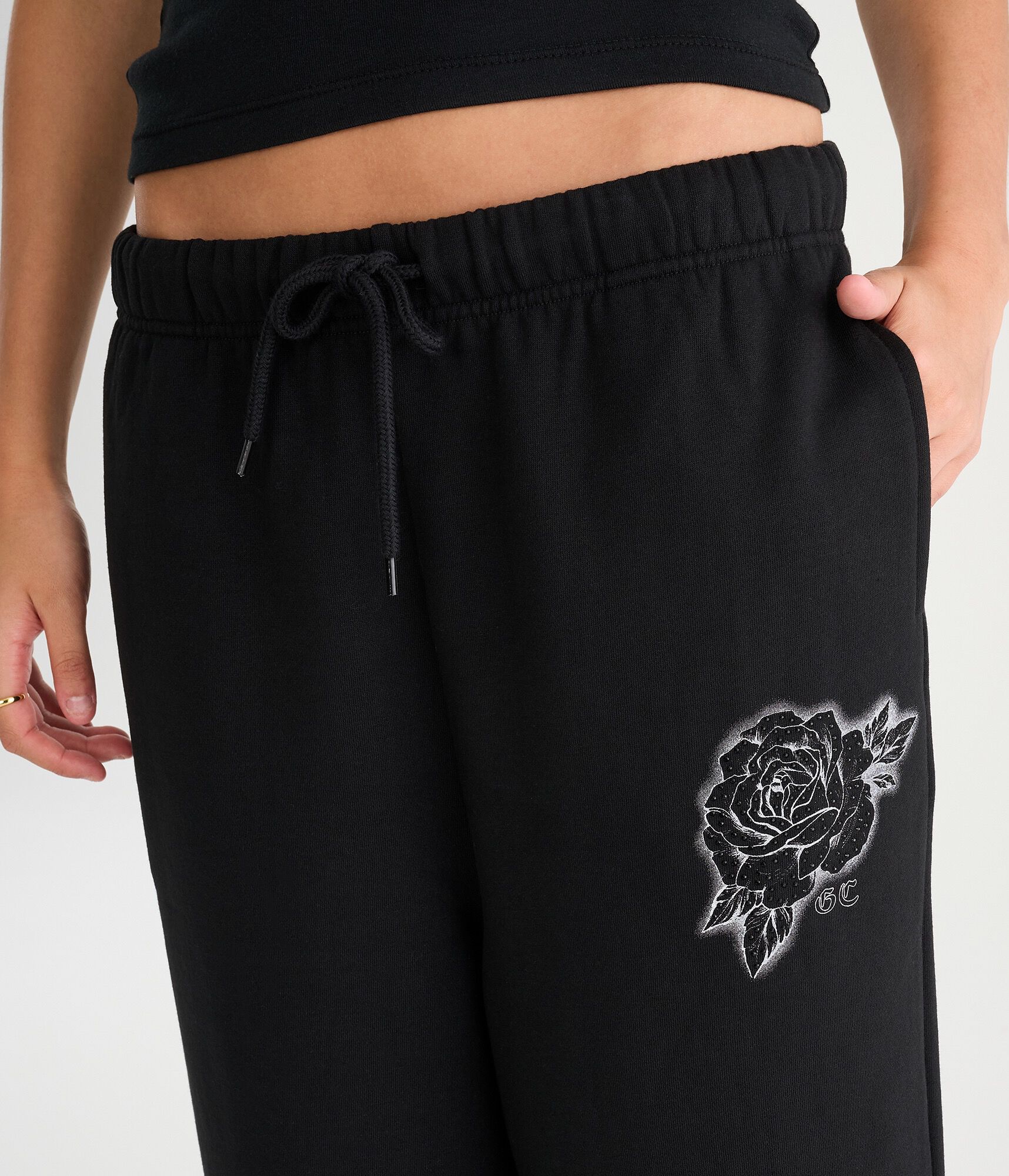 D&eacute;j&agrave; For Aero Rhinestone Rose Low-Rise Baggy Fleece Shorts