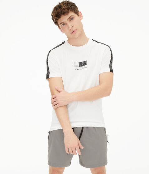 Grid Logo Sleeve Tape Stretch Graphic Tee Grid Logo Sleeve Tape Stretch Graphic Tee
