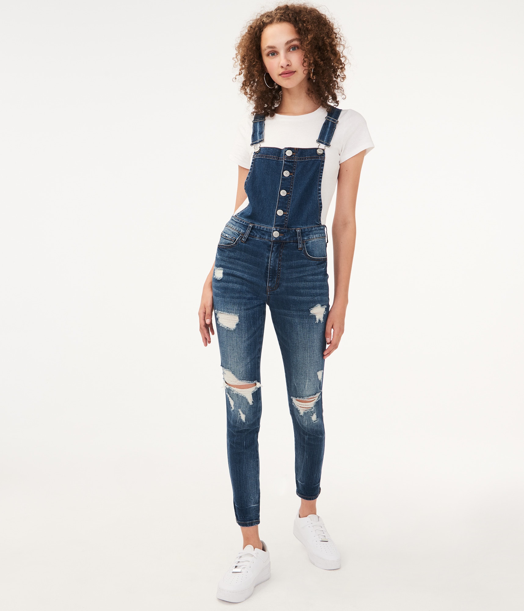 black skinny jean overalls