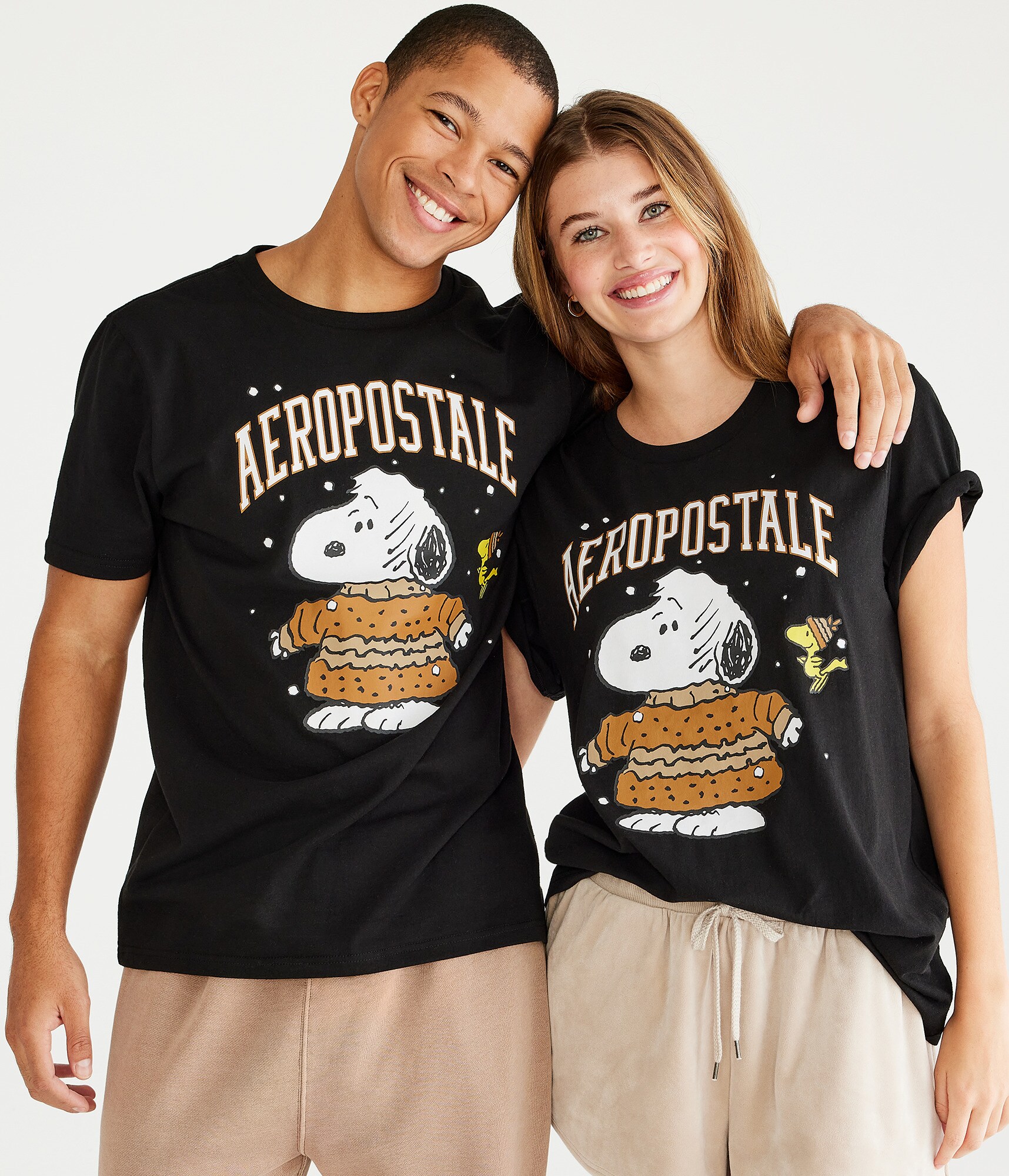 Peanuts® | Aéropostale Snoopy Sweater Logo Graphic Tee Peanuts® | Aéropostale Snoopy Sweater Logo Graphic Tee